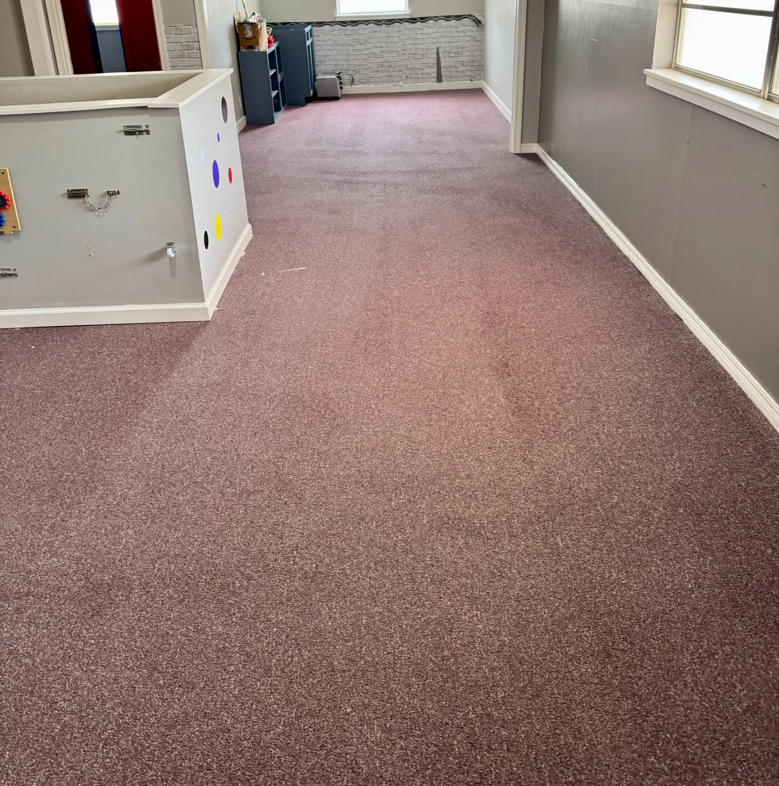 Large room carpet after commercial spot and traffic-area cleaning